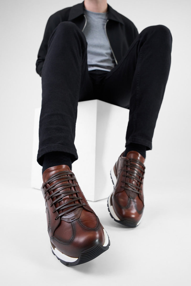 OWEN cocoa-brown triple stitched wingtip patina runners.