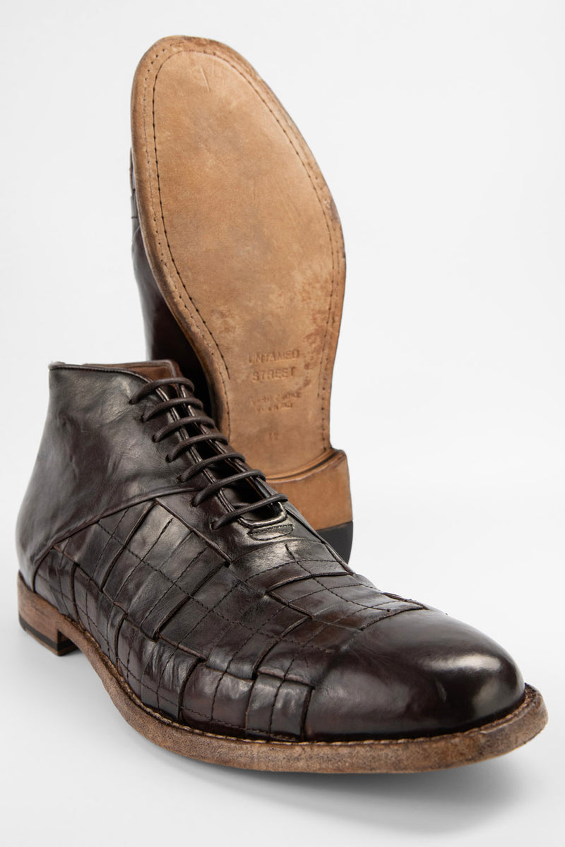 PARKER dark-cocoa woven leather chukka boots.