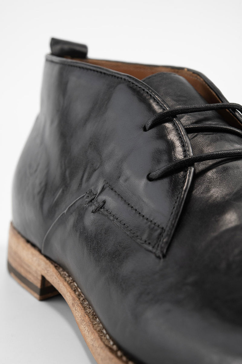 PARKER royal-black chukka boots.