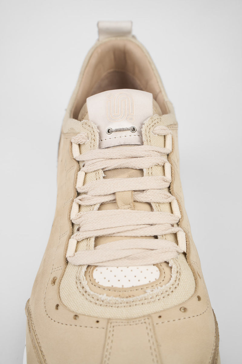 PEARCE desert-brown nubuck wingtip runners.