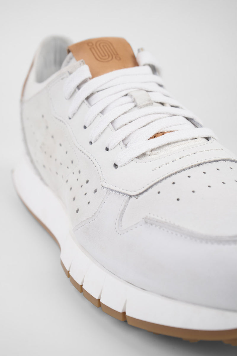 PEARCE limestone-white nubuck runners.