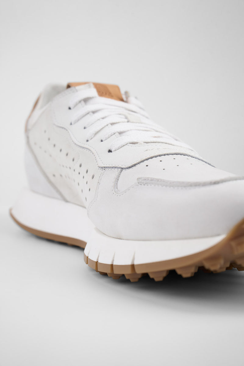 PEARCE limestone-white nubuck runners.