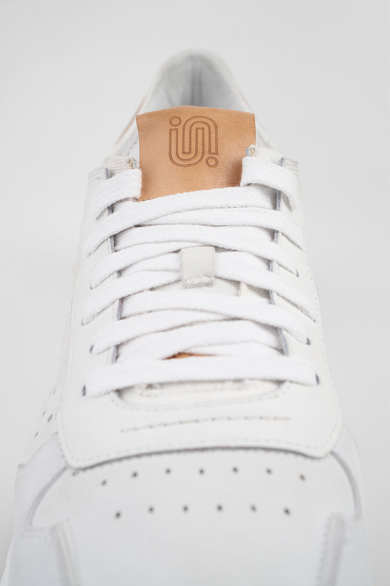 PEARCE limestone-white nubuck runners.