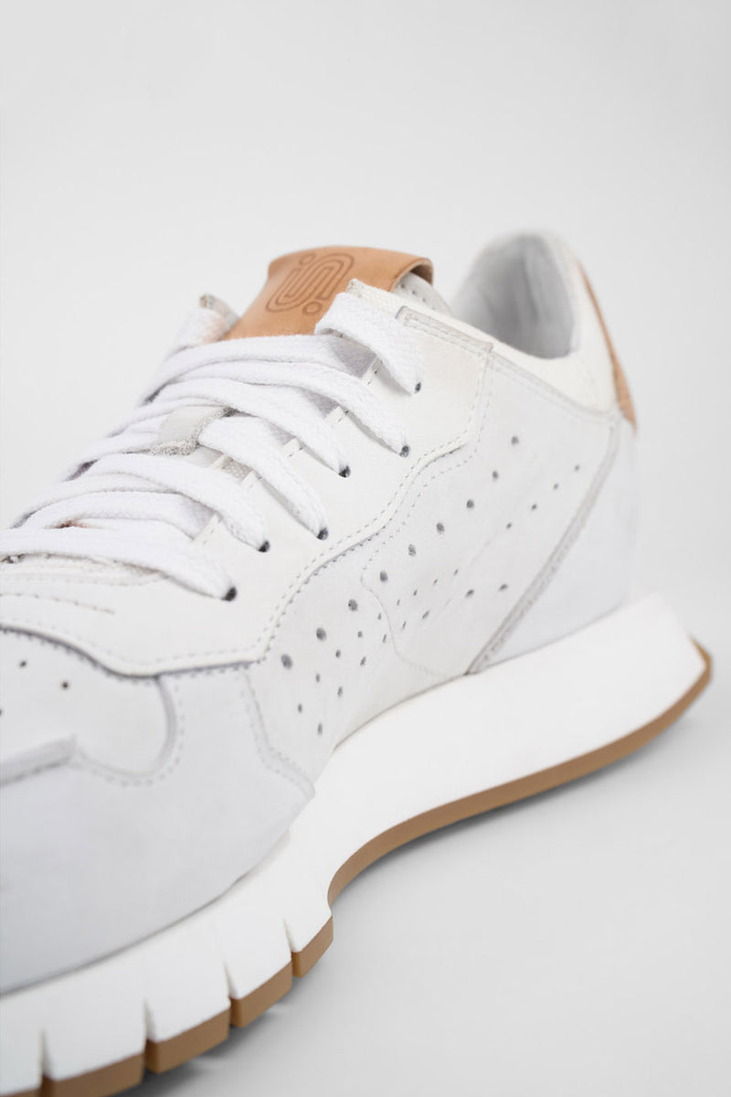 PEARCE limestone-white nubuck runners.