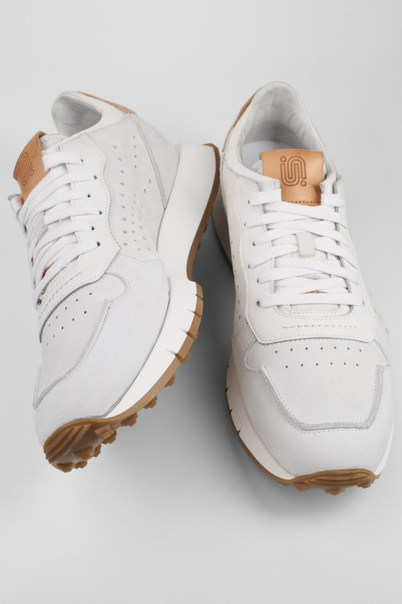 PEARCE limestone-white nubuck runners.