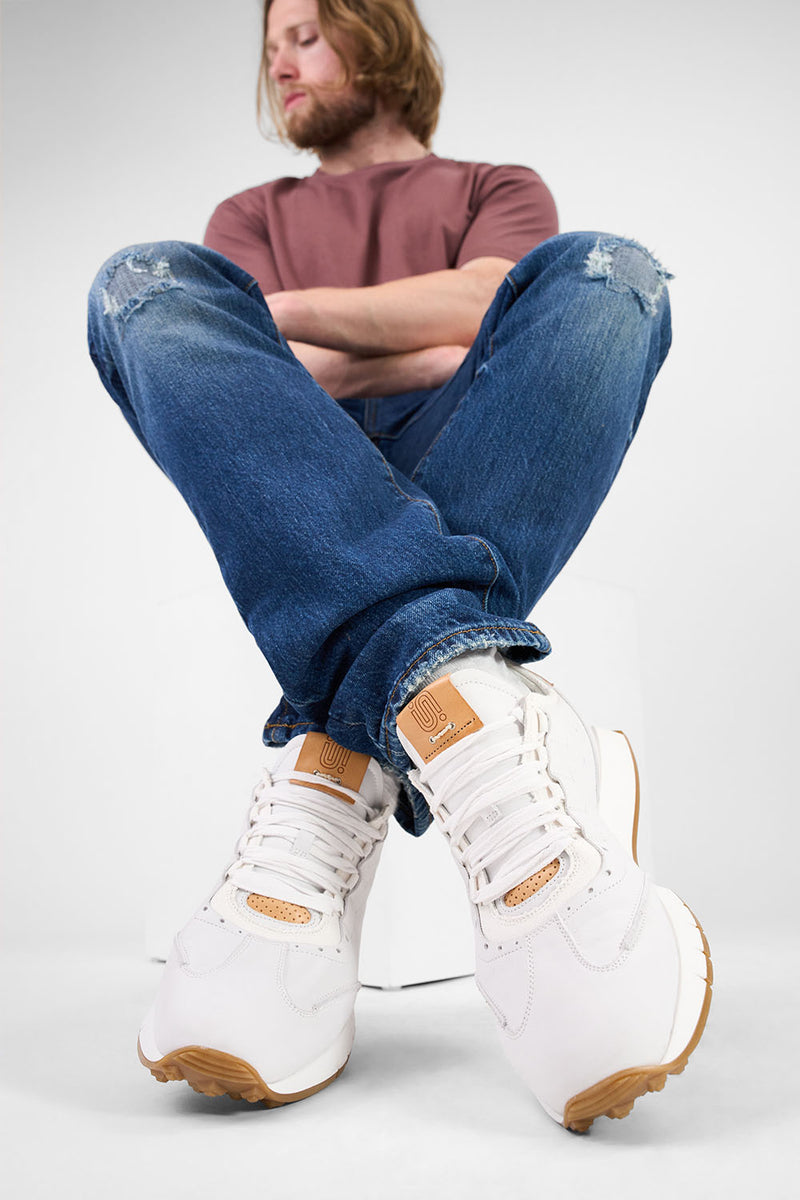 PEARCE limestone-white nubuck wingtip runners.
