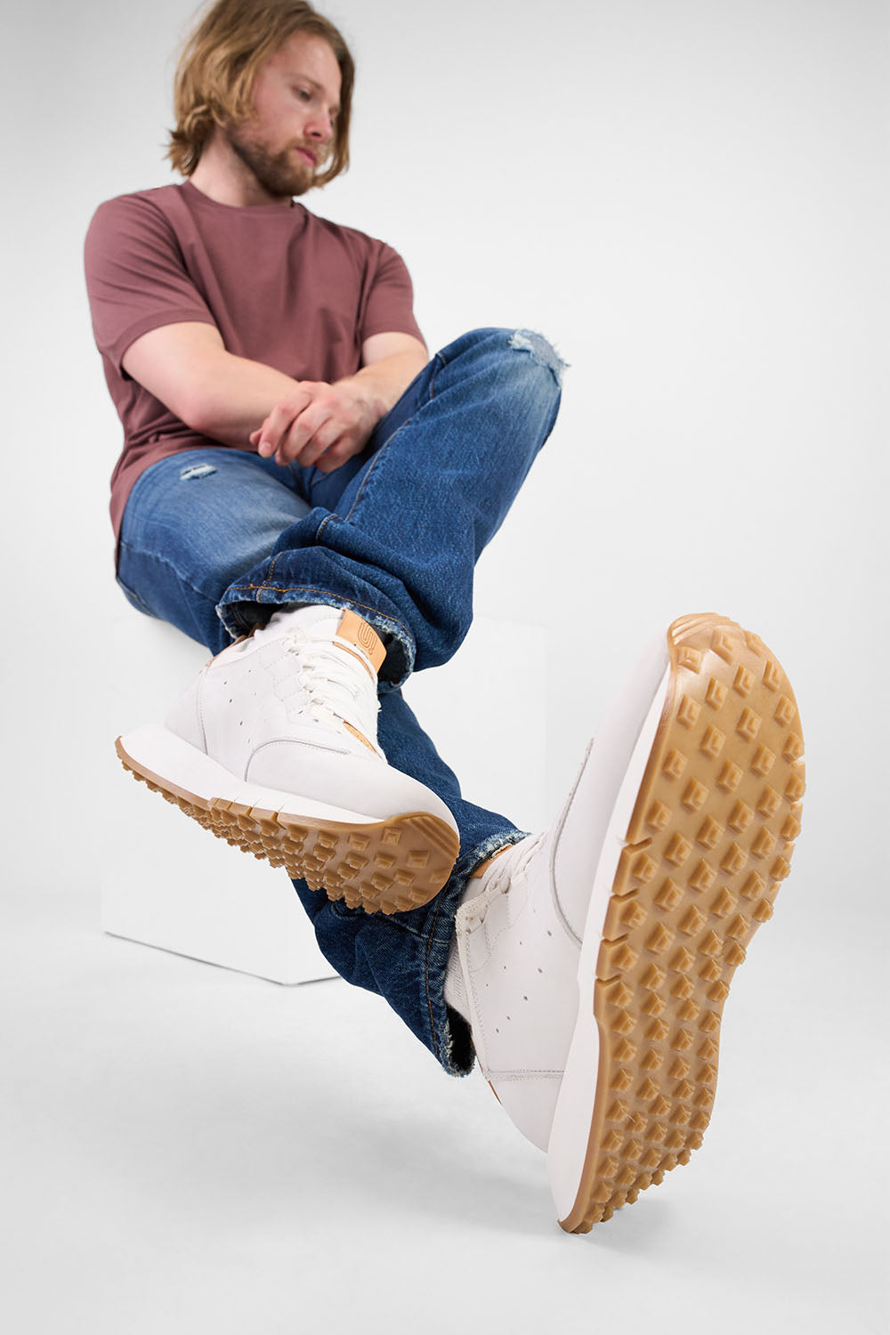 PEARCE limestone-white nubuck wingtip runners.