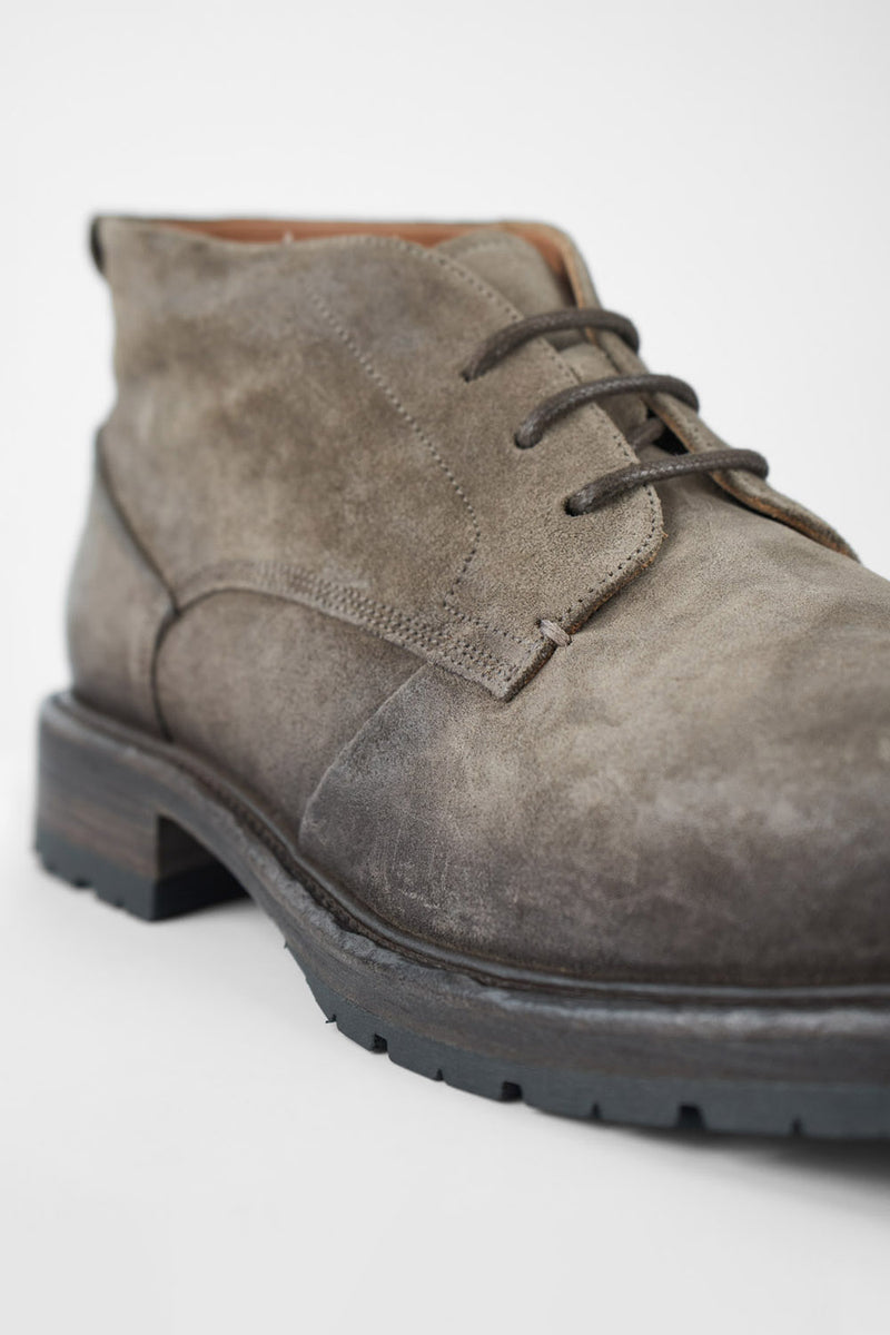 ROWLEY ash-brown folded suede chukka boots.