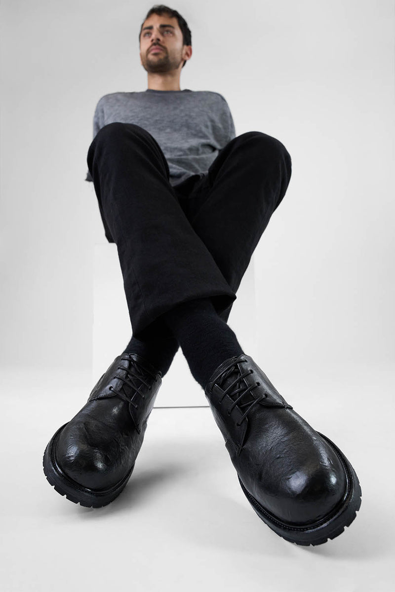 ROWLEY coal-black folded derby shoes.