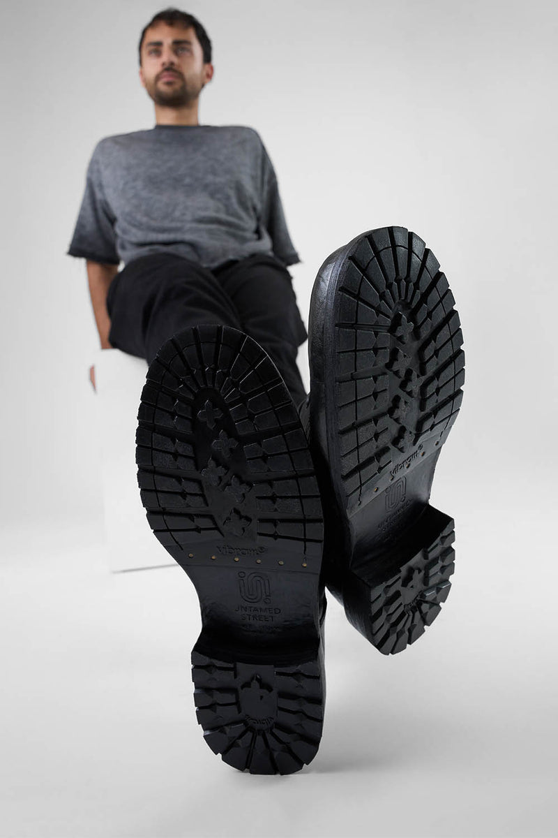 ROWLEY coal-black folded derby shoes.