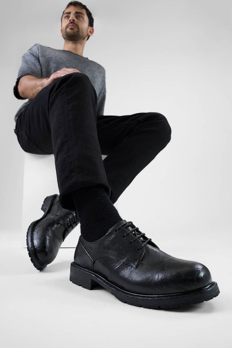 ROWLEY coal-black folded derby shoes.