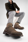 ROWLEY dark-earth folded suede laceless boots.