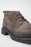 ROWLEY ash-brown folded suede chukka boots.