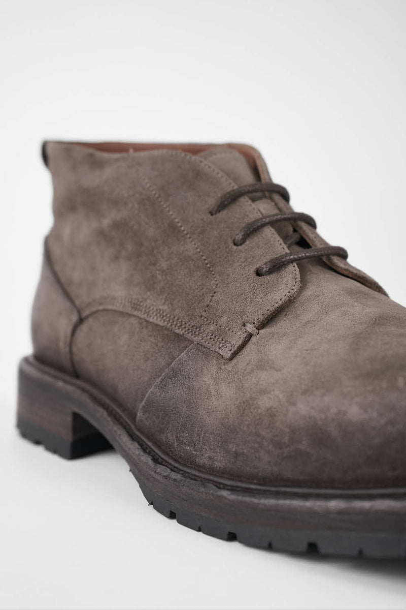 ROWLEY ash-brown folded suede chukka boots.