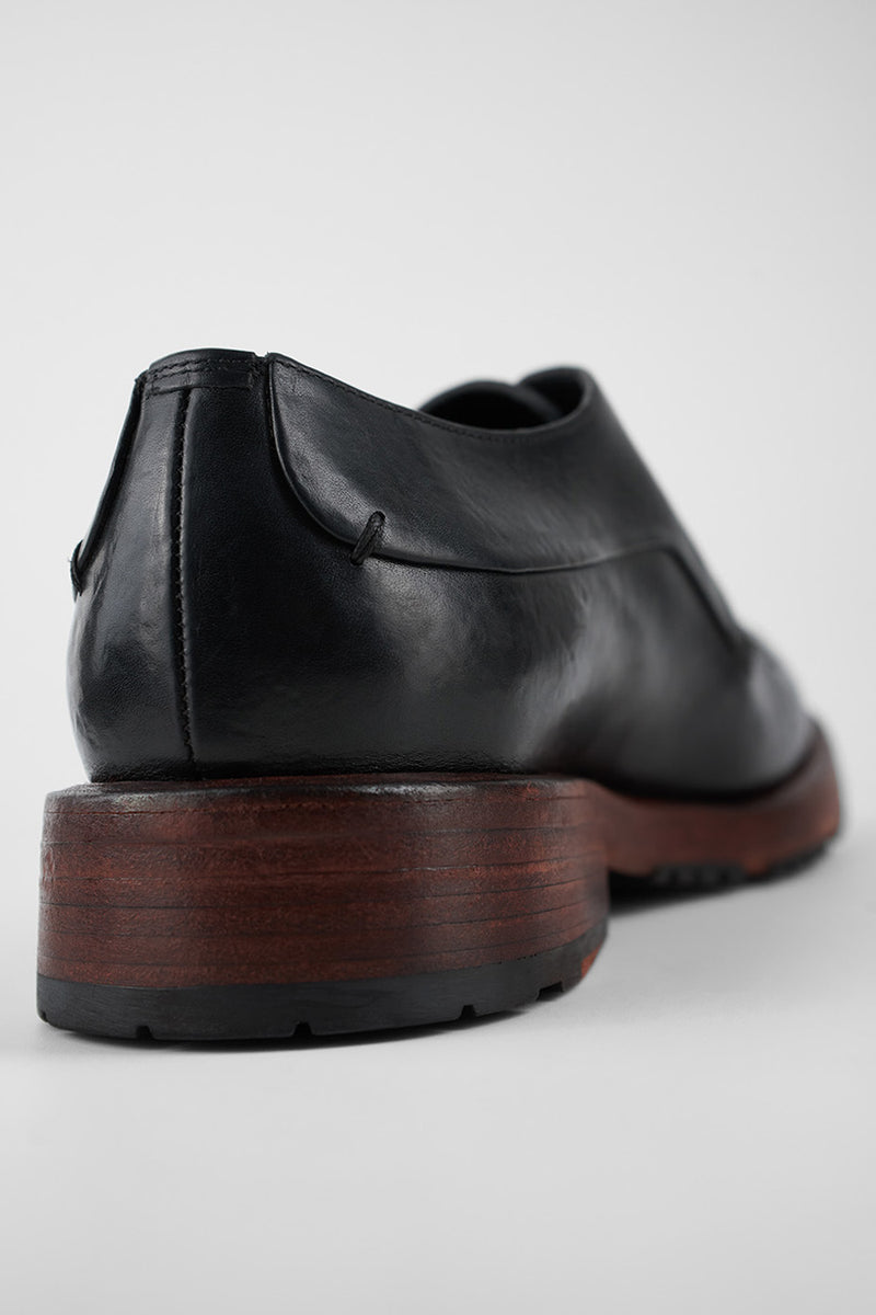 SCOTT jet-black derby shoes.