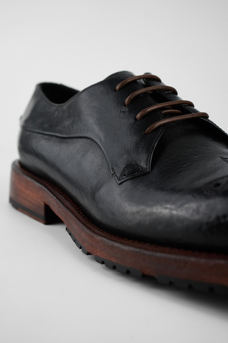 SCOTT jet-black derby shoes.