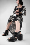 SHELLEY jet-black slingback mid-heel sandals.