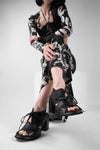 SHELLEY jet-black slingback mid-heel sandals.