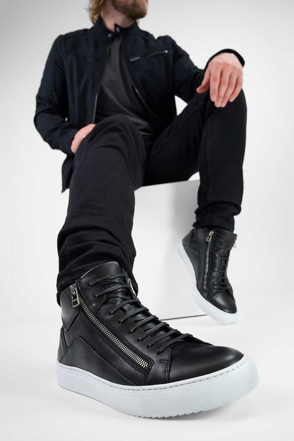 SKYE tuxedo-black triple stitched high sneakers.