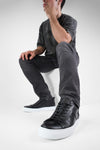 SKYE tuxedo-black folded sneakers.