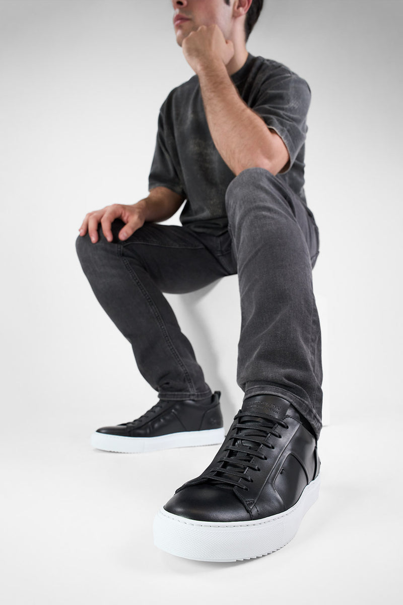 SKYE tuxedo-black folded sneakers.