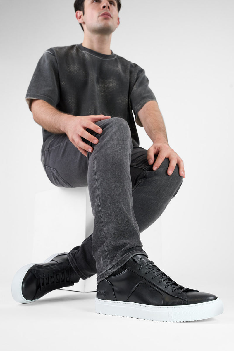 SKYE tuxedo-black folded sneakers.