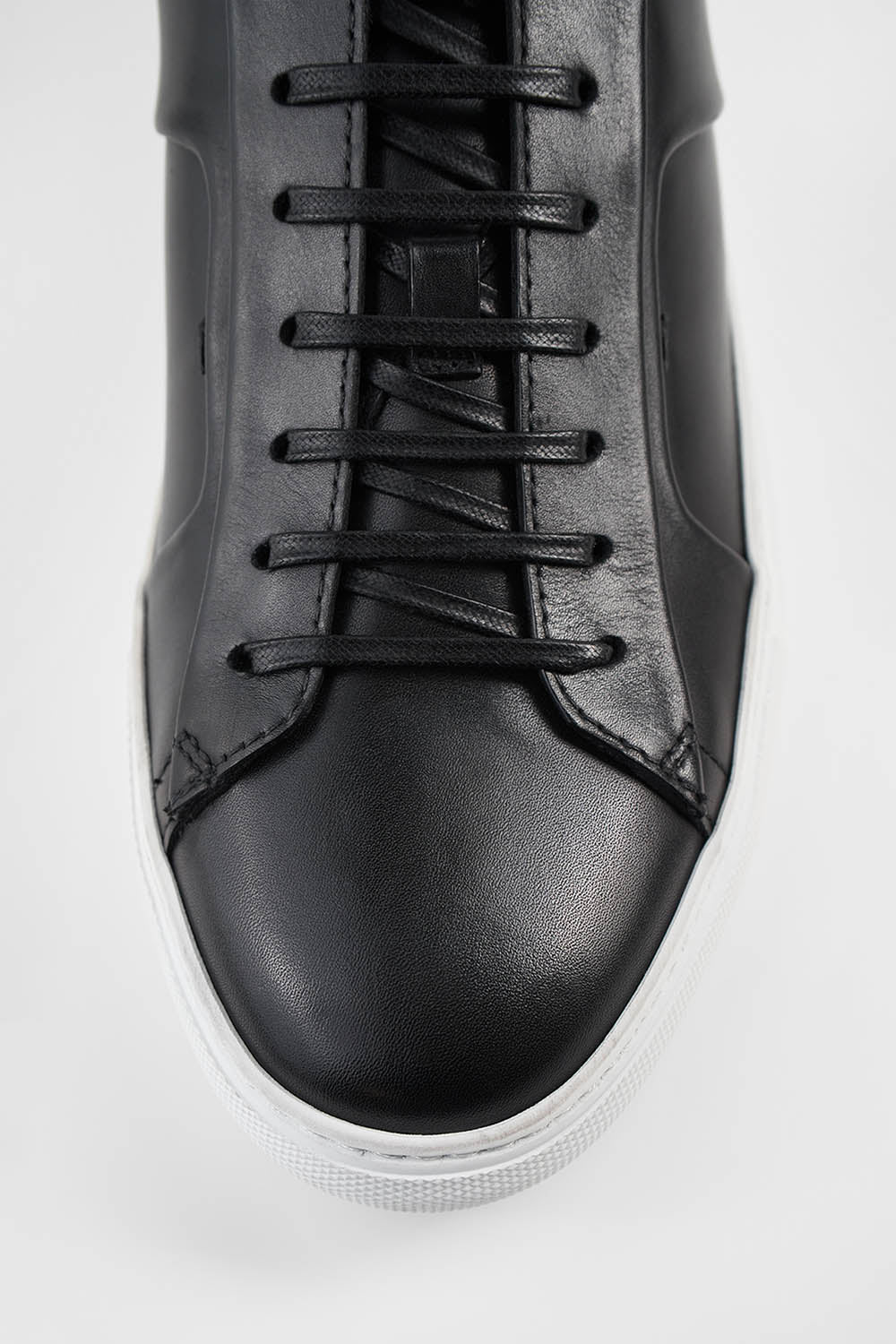 OVERSIZED SNEAKERS IN BLACK TEXTURED LAMBSKIN