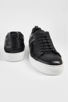 SKYE tuxedo-black folded sneakers.