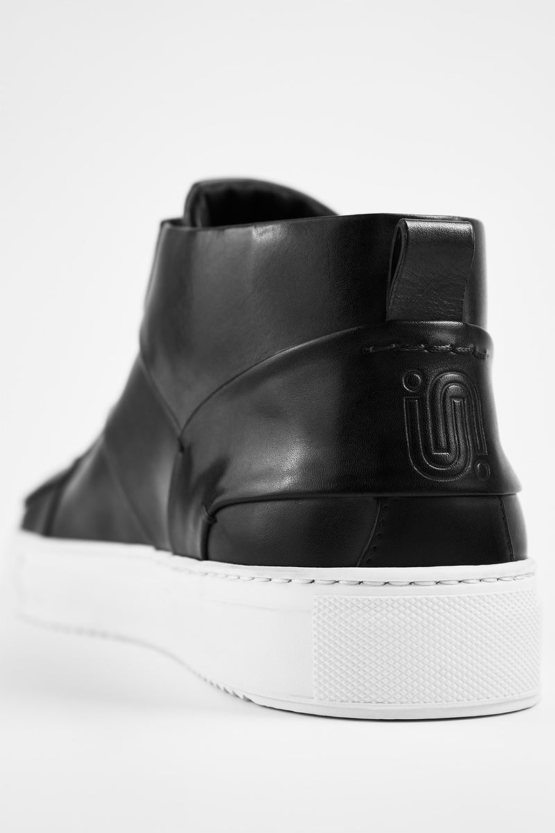 SKYE tuxedo-black folded mid sneakers.