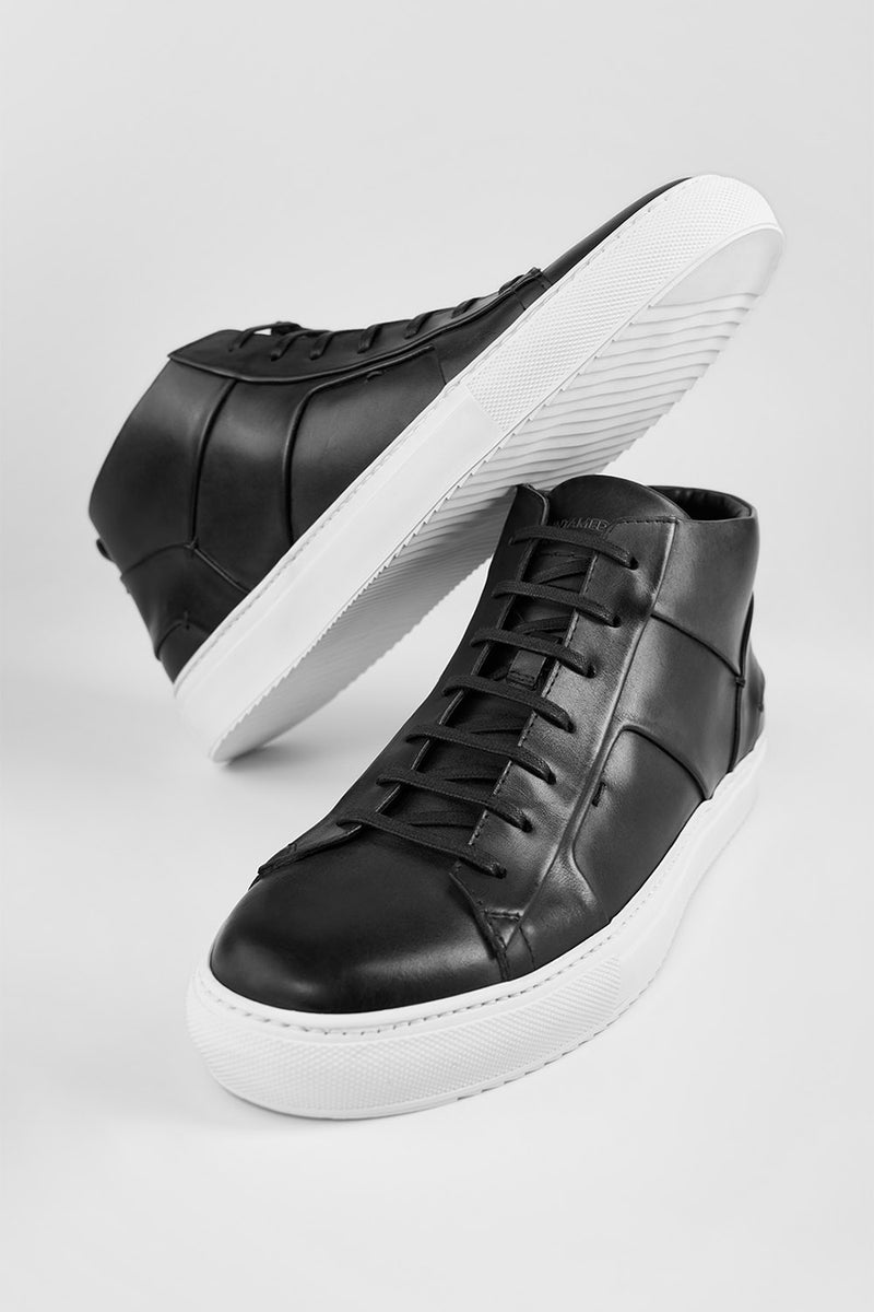 SKYE tuxedo-black folded mid sneakers.