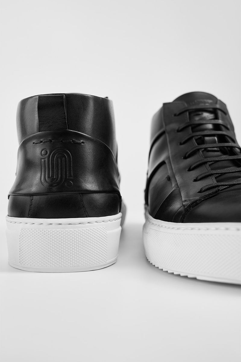 SKYE tuxedo-black folded mid sneakers.