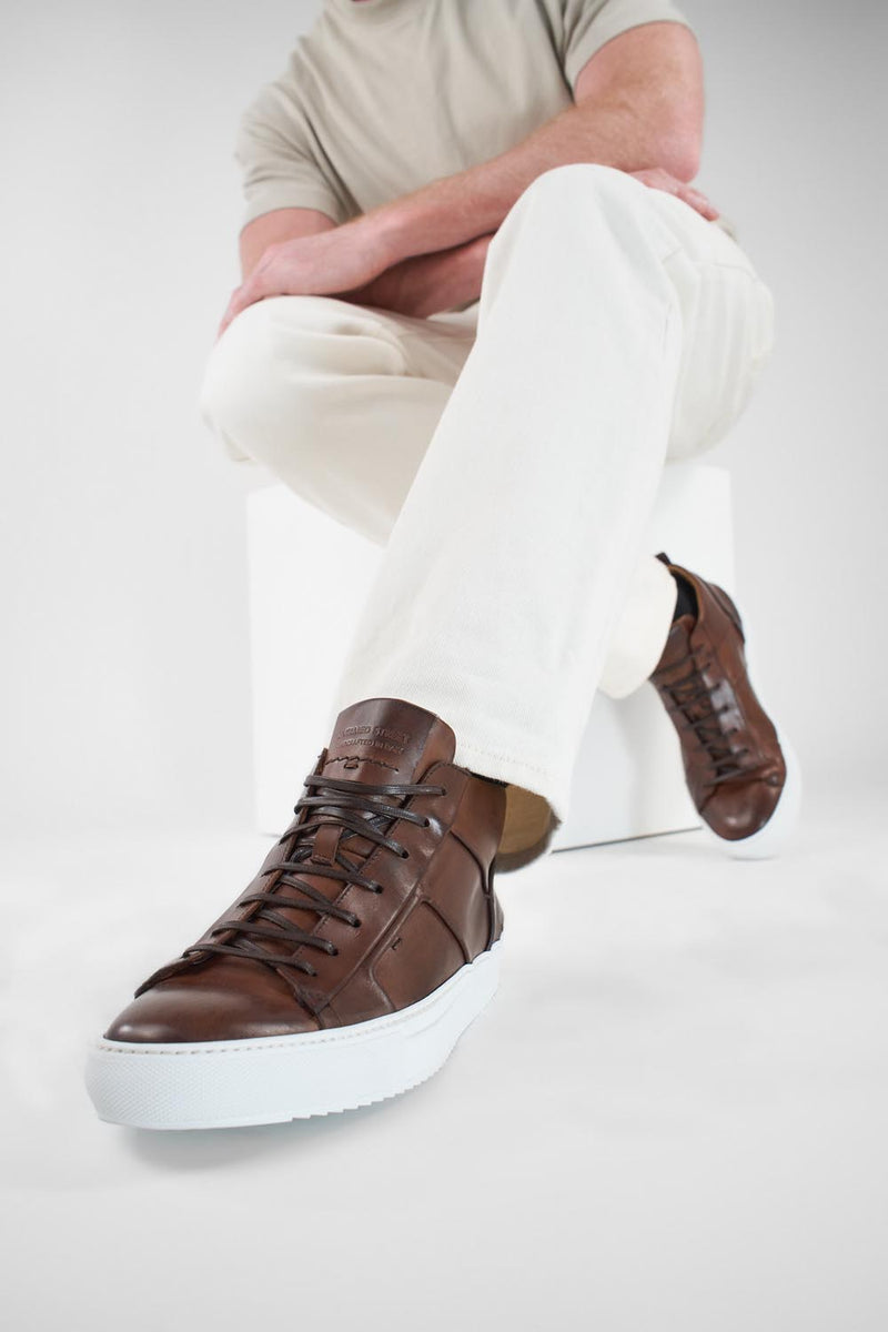 SKYE noble-brown folded mid patina sneakers.