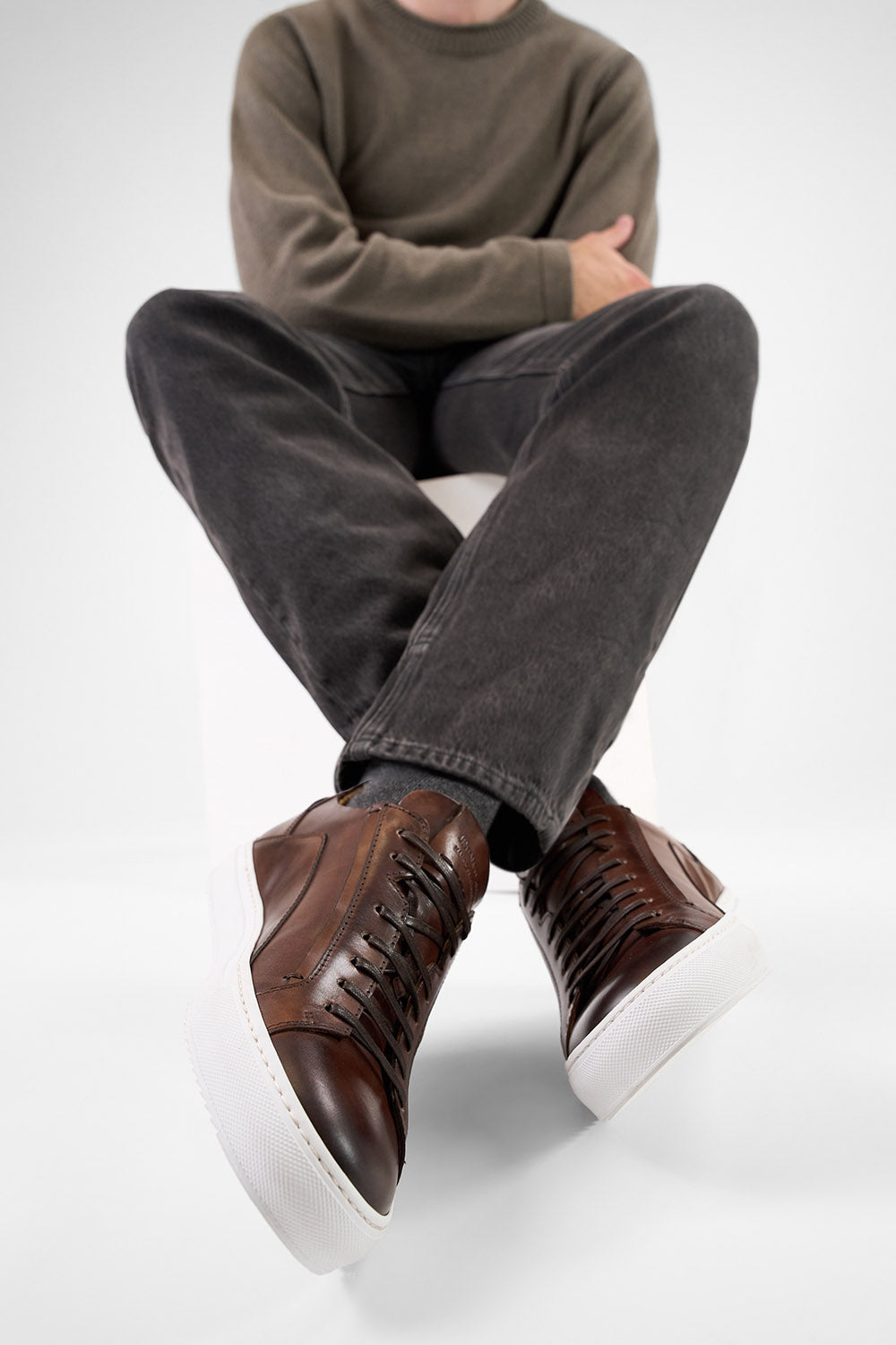 SKYE noble-brown triple stitched patina sneakers.
