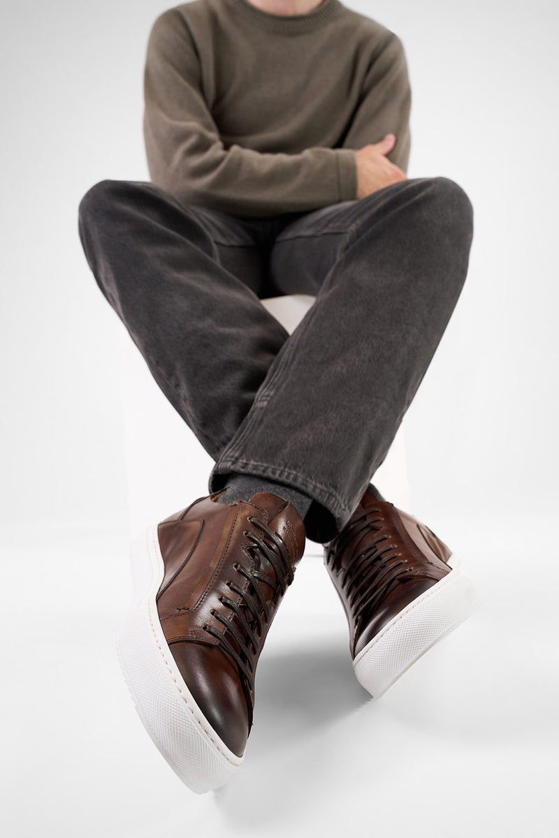 SKYE noble-brown triple stitched patina sneakers.