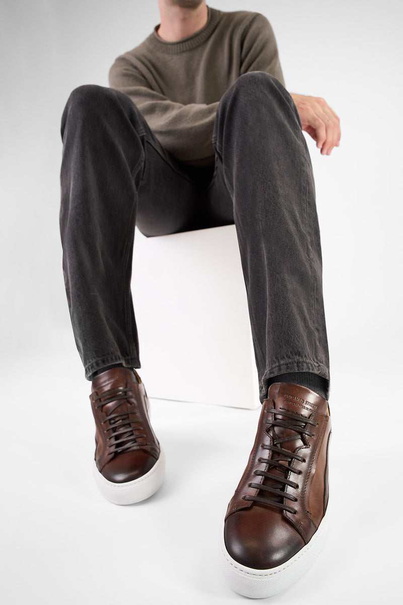 SKYE noble-brown triple stitched patina sneakers.