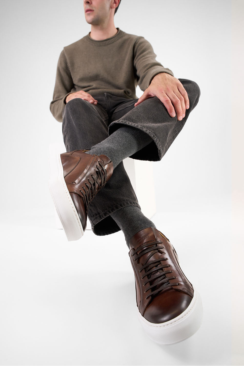 SKYE noble-brown triple stitched patina sneakers.