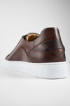 SKYE noble-brown triple stitched patina sneakers.