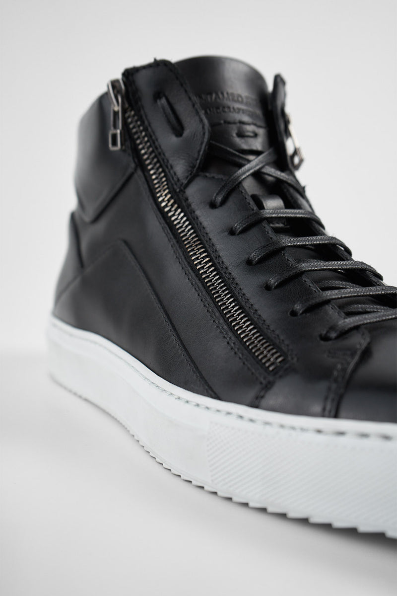 SKYE tuxedo-black triple stitched high sneakers.