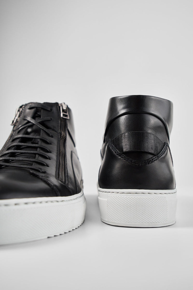 SKYE tuxedo-black triple stitched high sneakers.