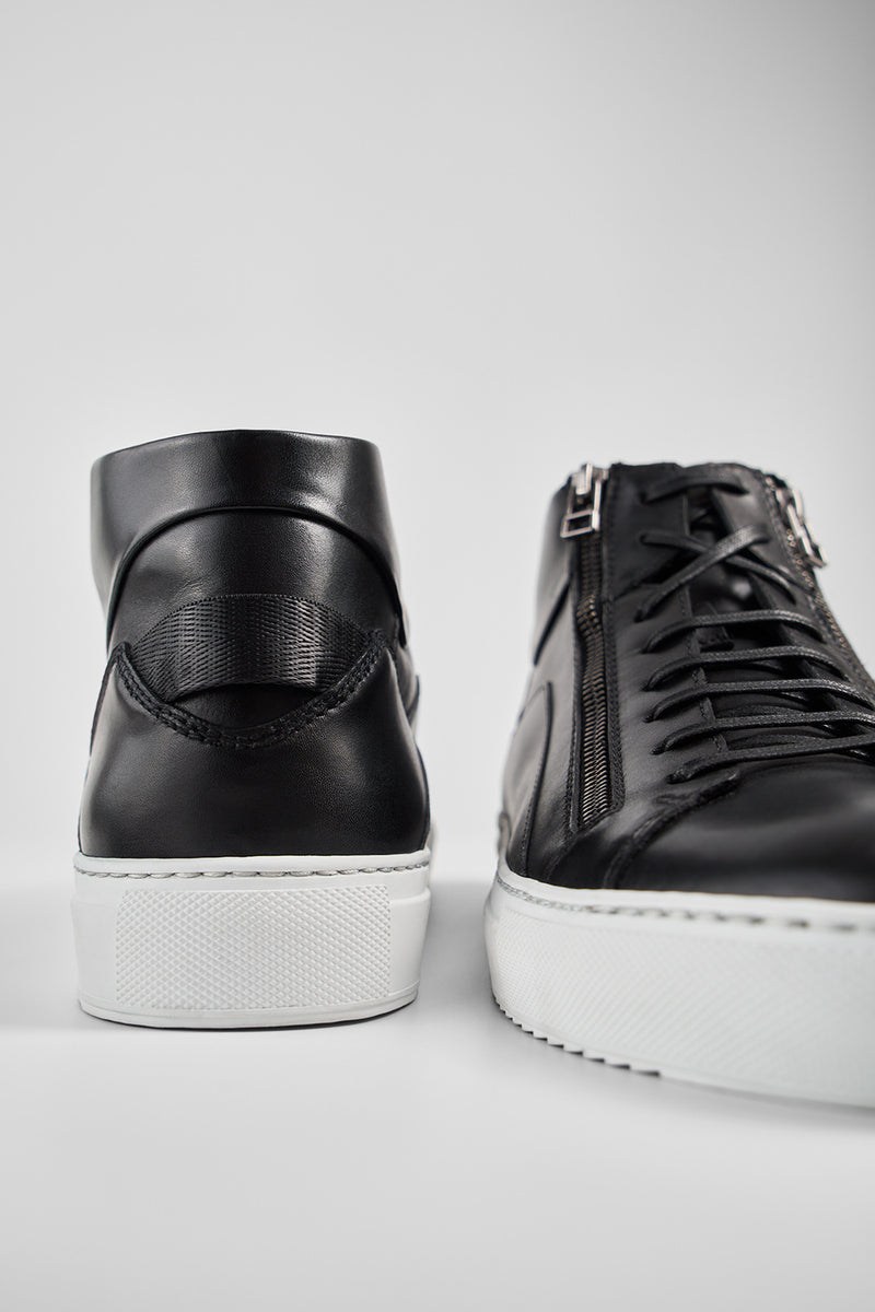 SKYE tuxedo-black triple stitched high sneakers.