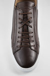 SKYE noble-brown triple stitched patina sneakers.