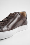 SKYE noble-brown triple stitched patina sneakers.