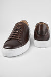 SKYE noble-brown triple stitched patina sneakers.