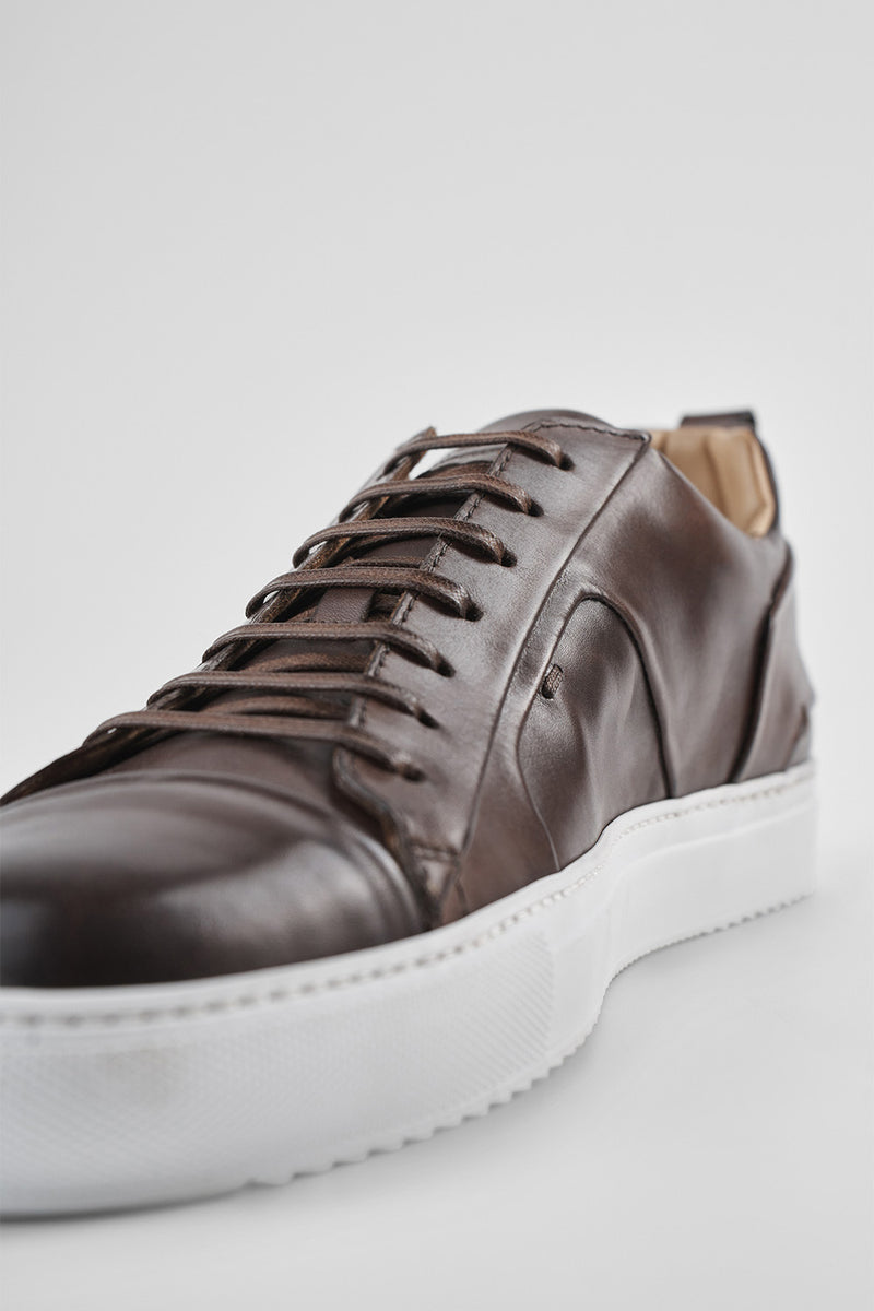 SKYE noble-brown folded patina sneakers.