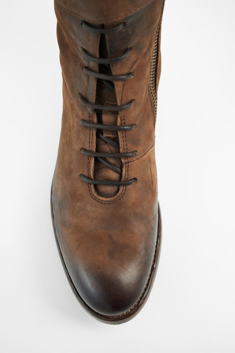 SLOANE chocolate lace-up buckle boots.