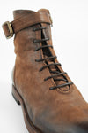 SLOANE chocolate lace-up buckle boots.