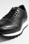 SOHO tuxedo-black wingtip runners.