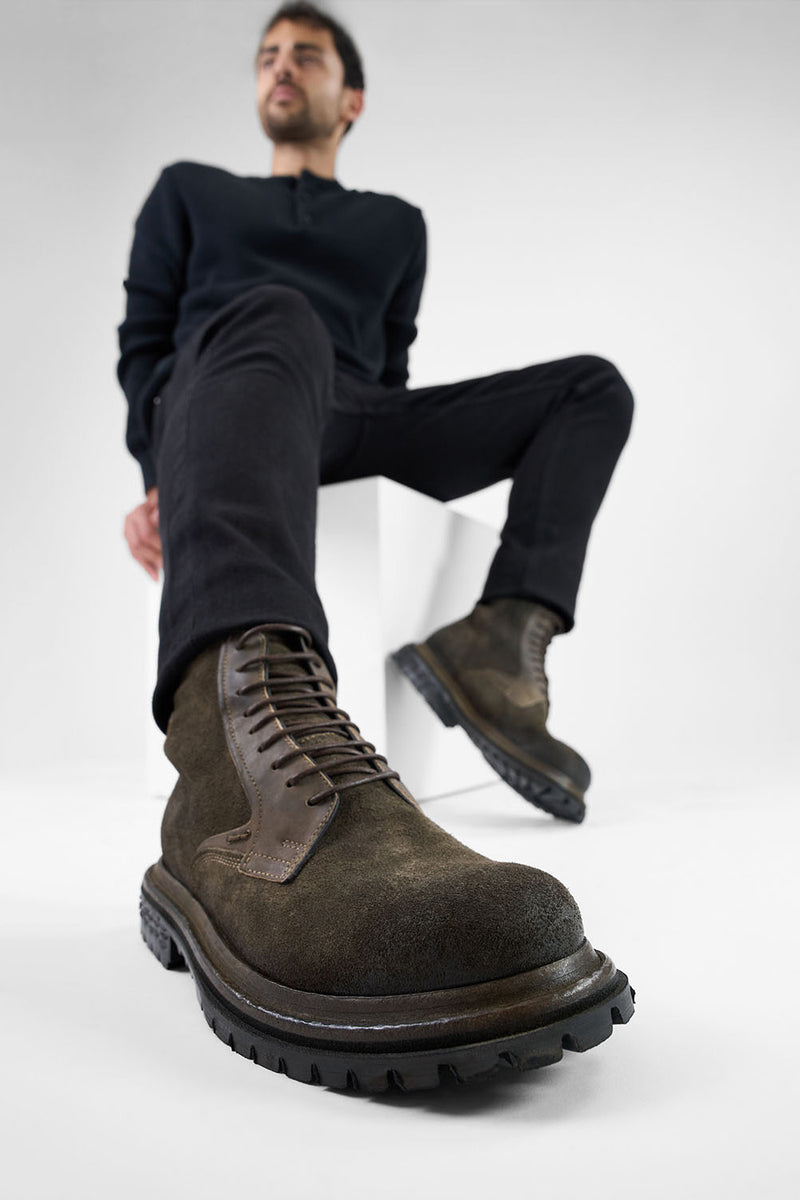 WARRICK dark-moss lace up boots.