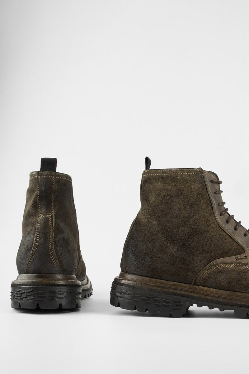 WARRICK dark-moss lace up boots.
