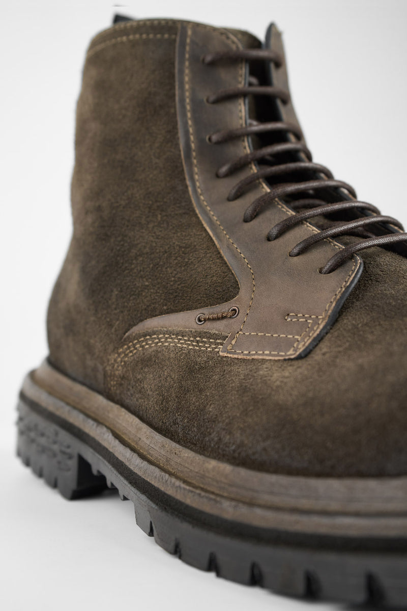 WARRICK dark-moss lace up boots.